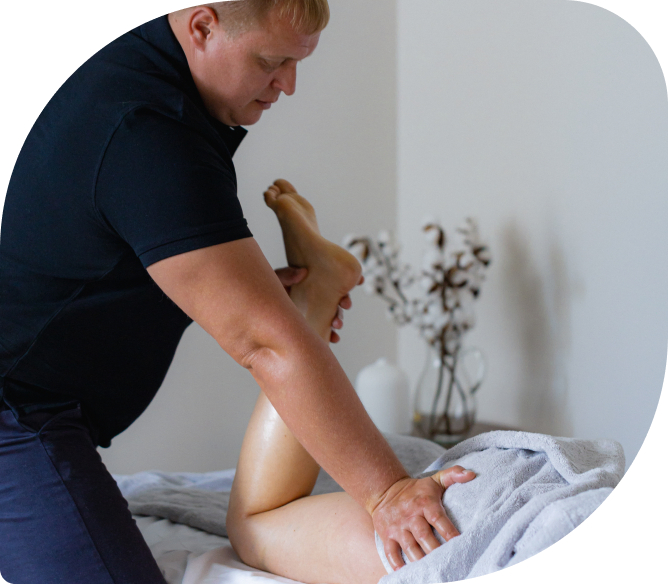 Certified massage therapist providing sports massage therapy to alleviate muscle tension and promote optimal athletic performance at Remedial Studio in London